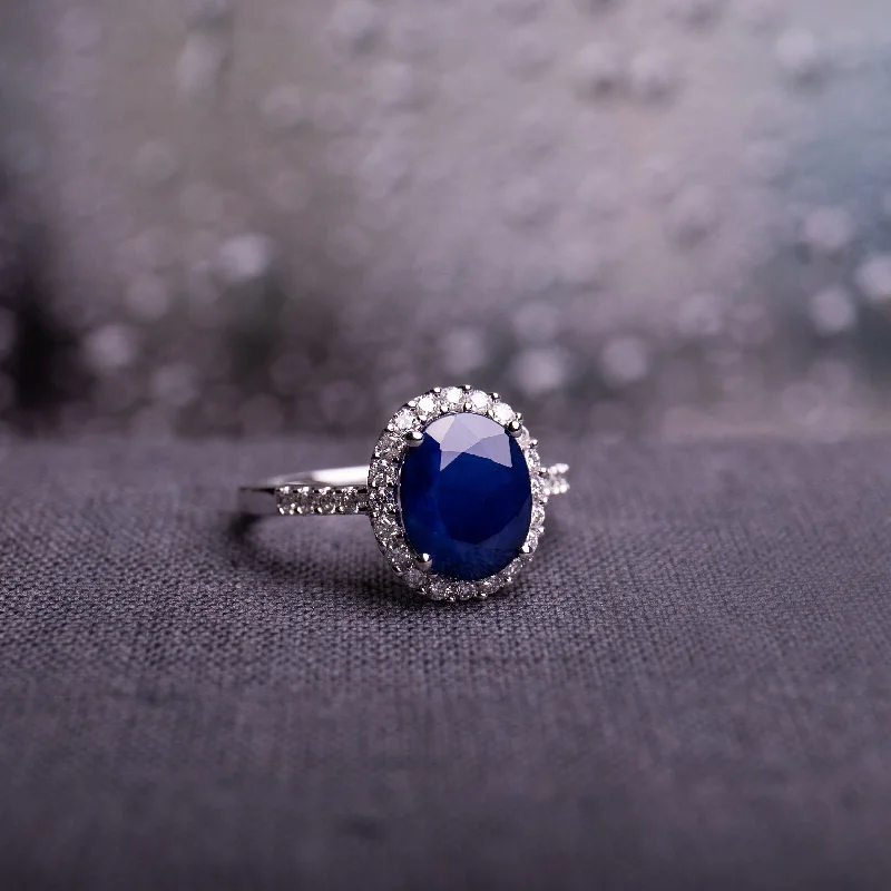 custom engagement rings with sapphires and diamonds-Diffused Sapphire and 2/5ct TDW Diamond Oval Halo Ring in 14k White Gold by Miadora