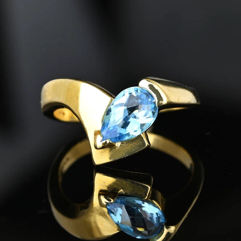 vintage engagement rings with diamonds and sapphires-Vintage Chevron Bypass Pear Cut Blue Topaz Ring in 14K Gold