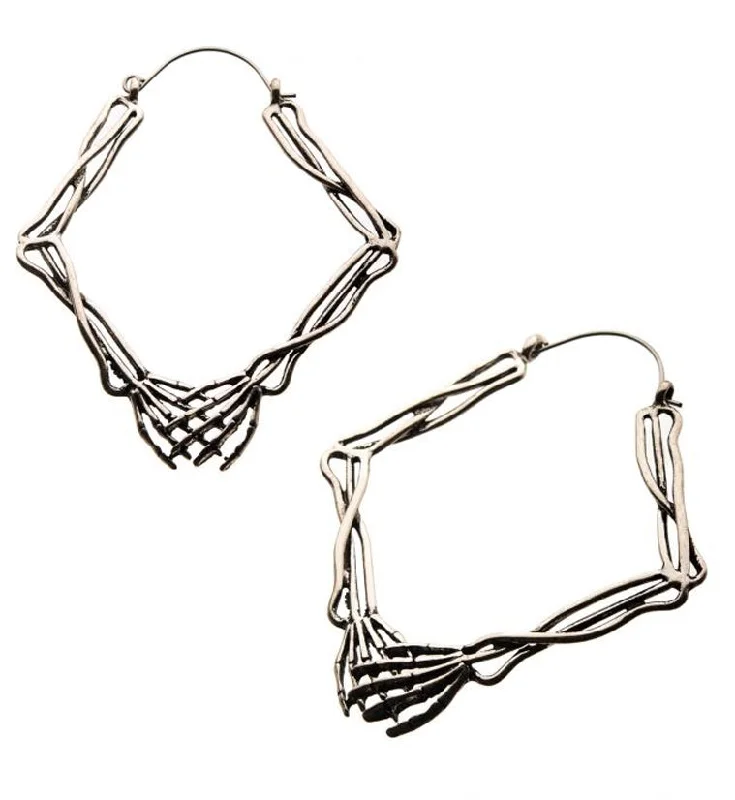 crystal stud earrings for a sparkling effect -20G Skeleton Hands Plug Hoops